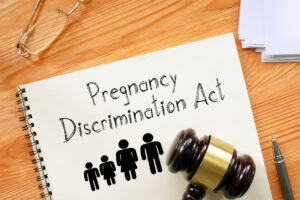 Pregnancy Discrimination Act of 1978 is shown on a photo using the text