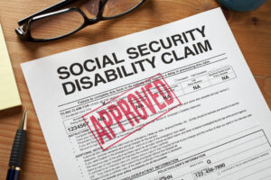 Approved Social Security Disability Claim Form on a desktop